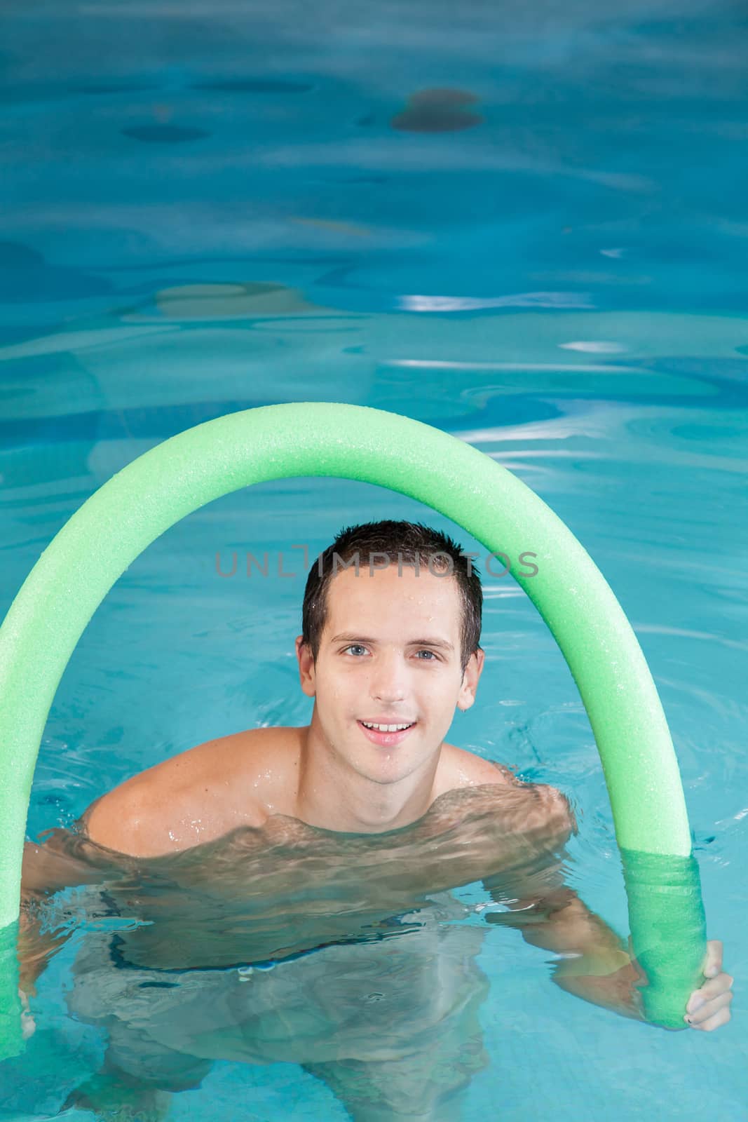 Man playing inside the pool by ifilms