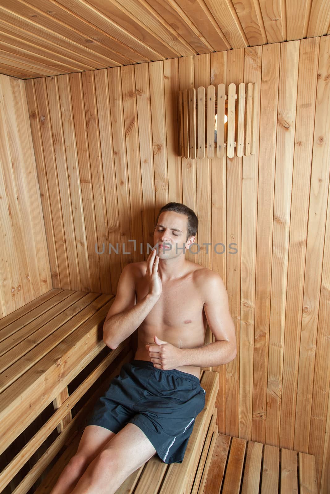 Man relaxed inside the sauna