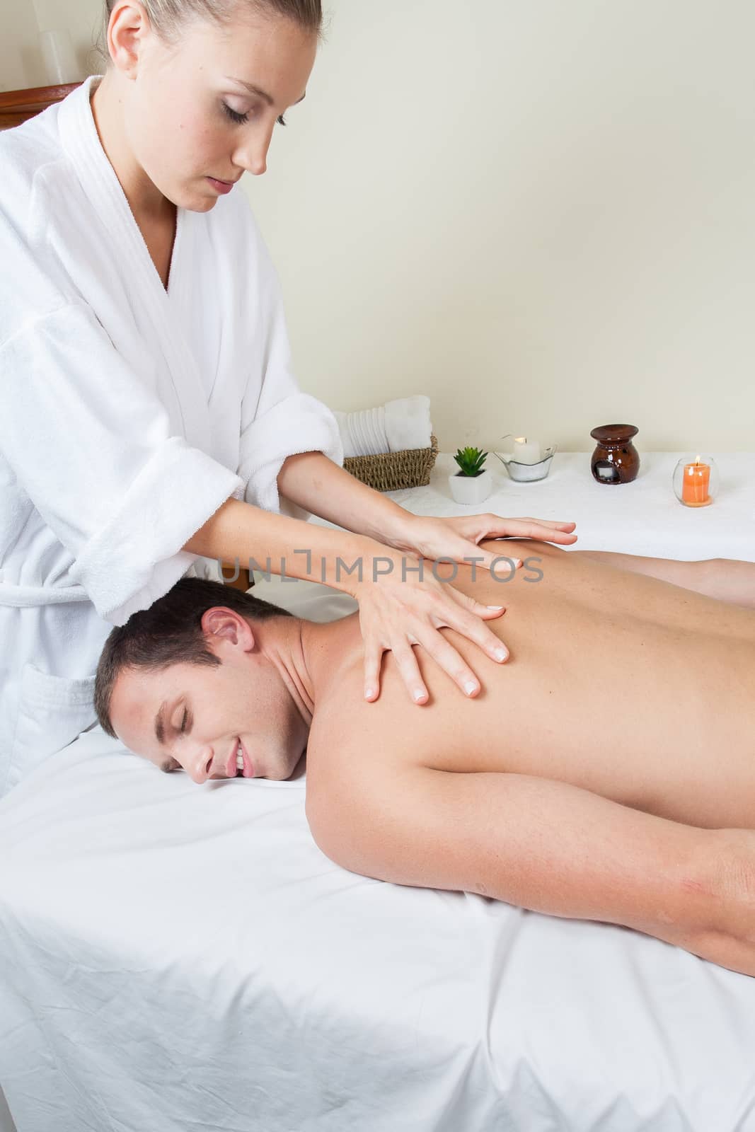 Woman give a massage to man