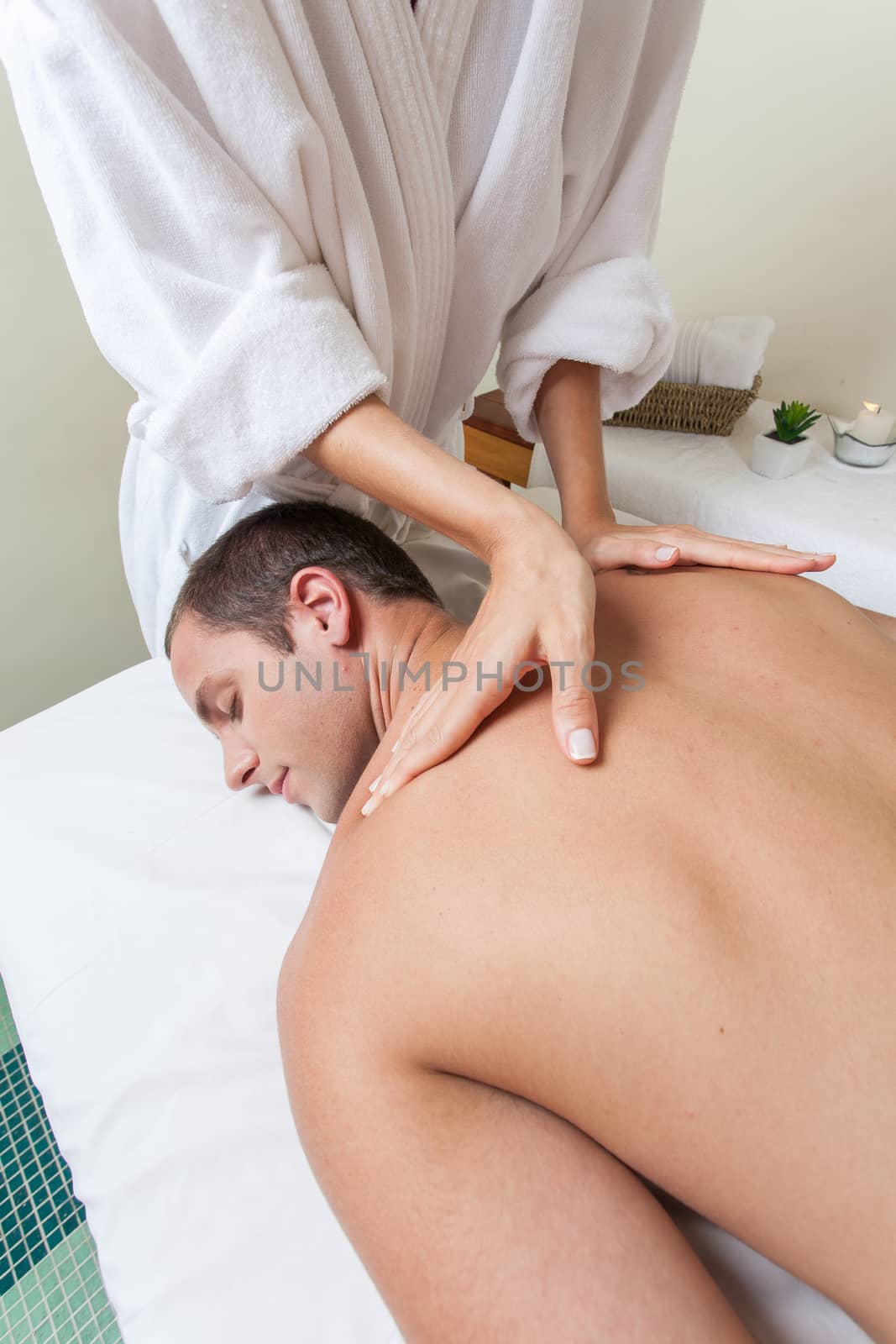 Man laid receiving massage by ifilms