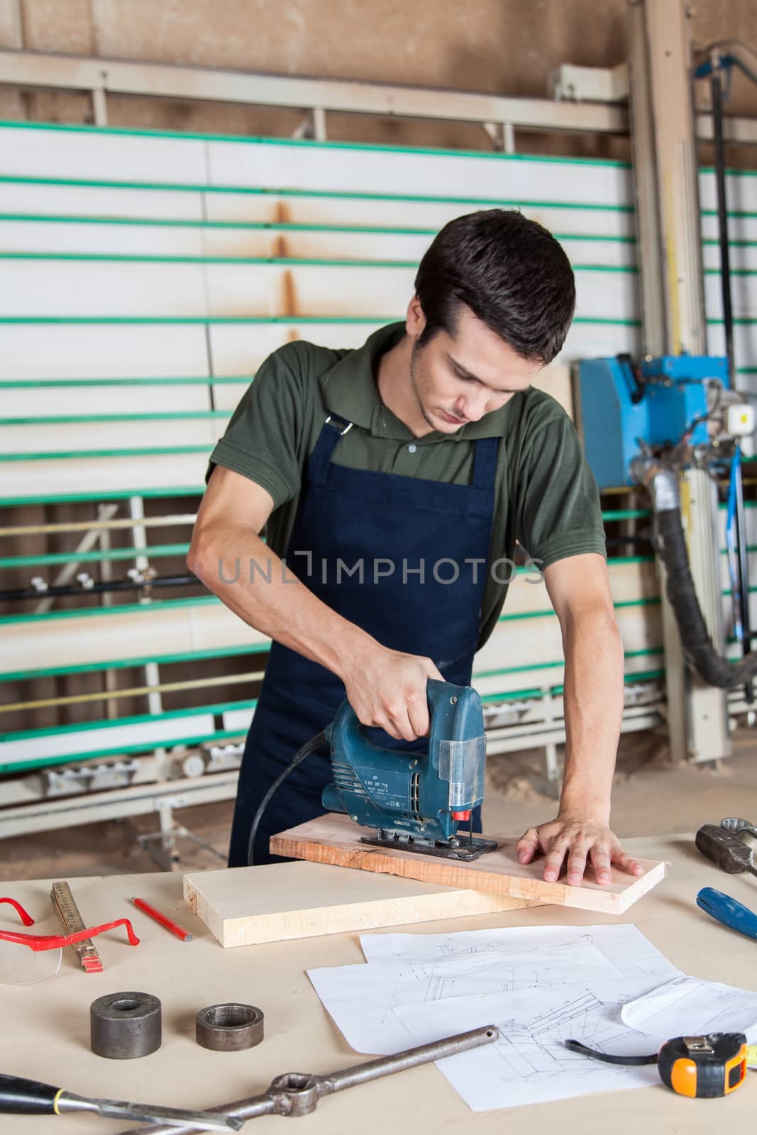 Carpenter working with a machine