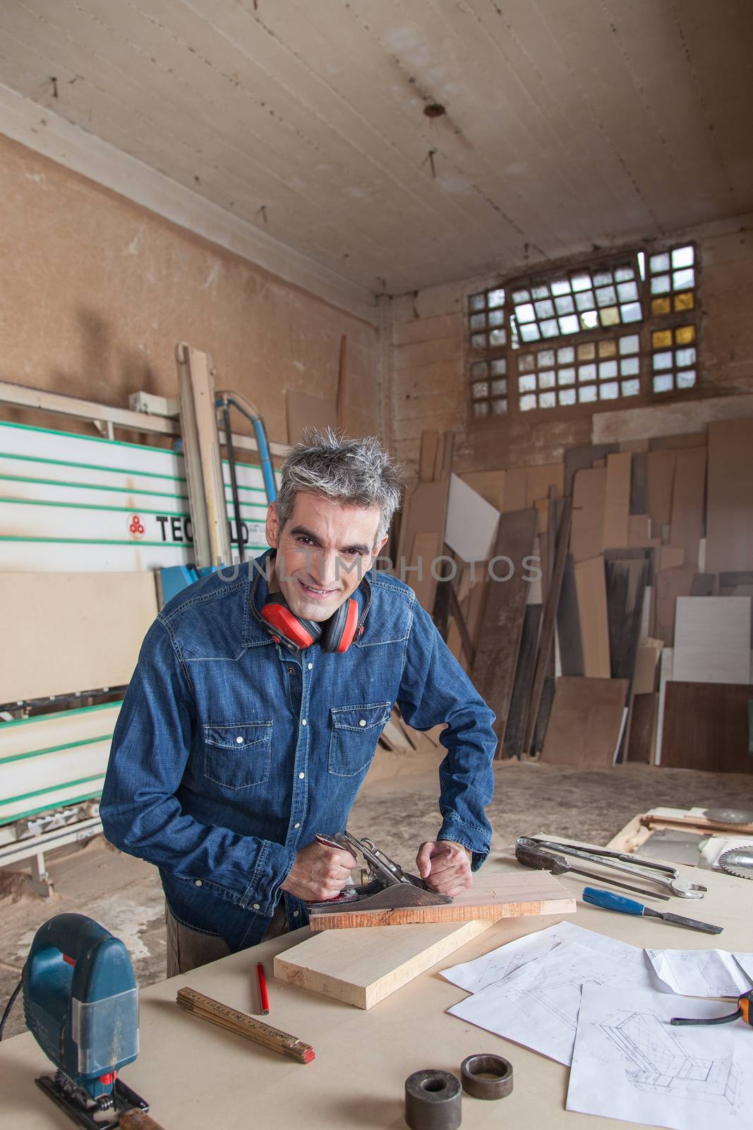 Carpenter working in his desk