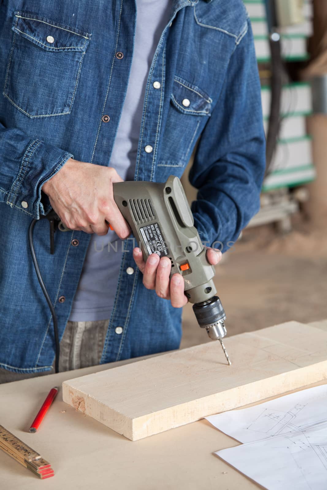 Man holding a drill
