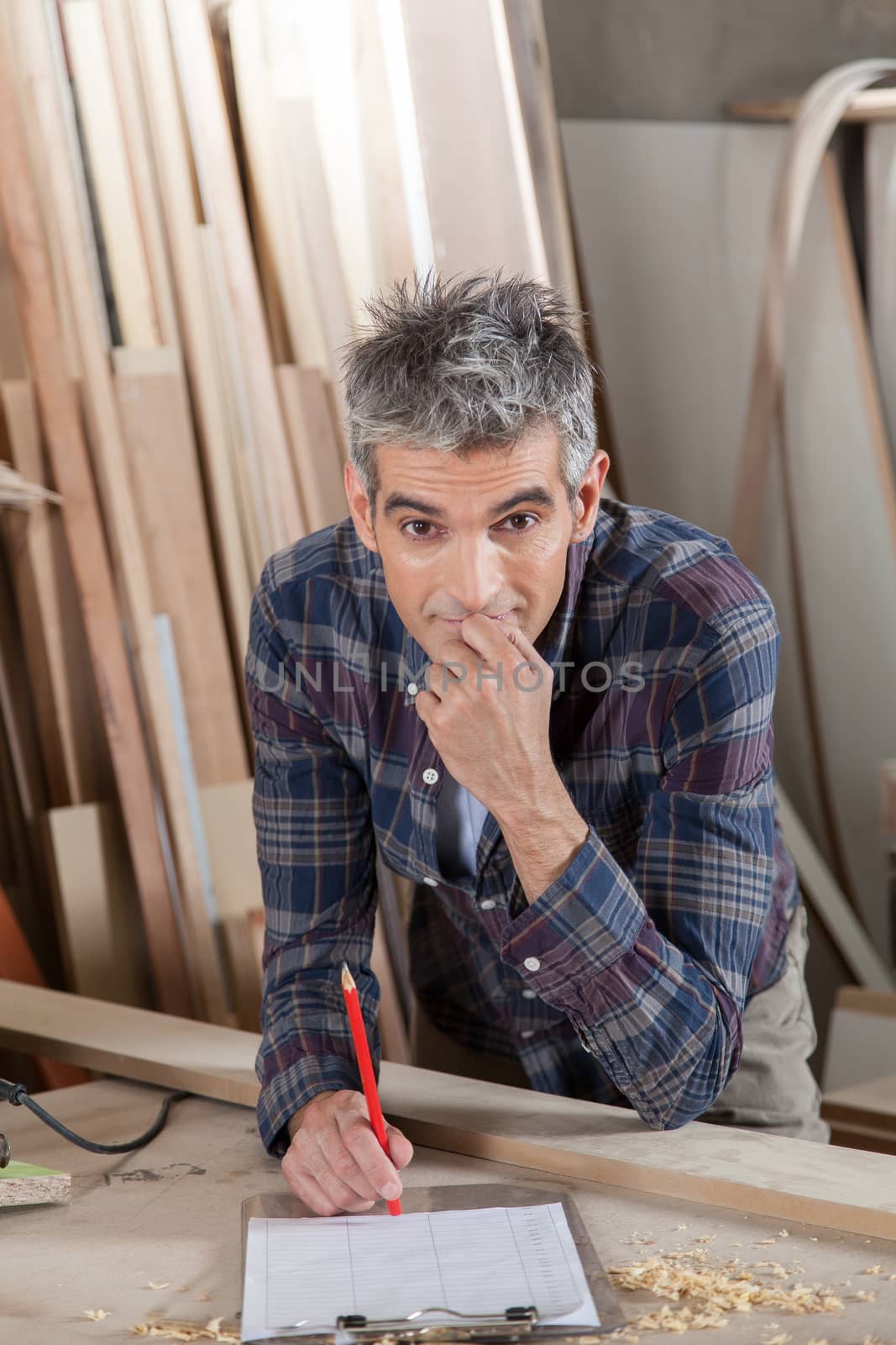 Man thinking in his workshop