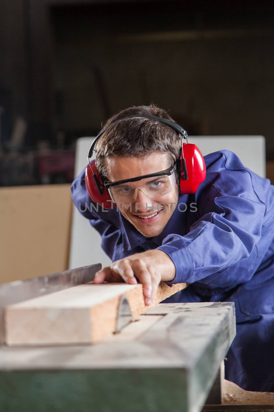 Carpenter working with a saw