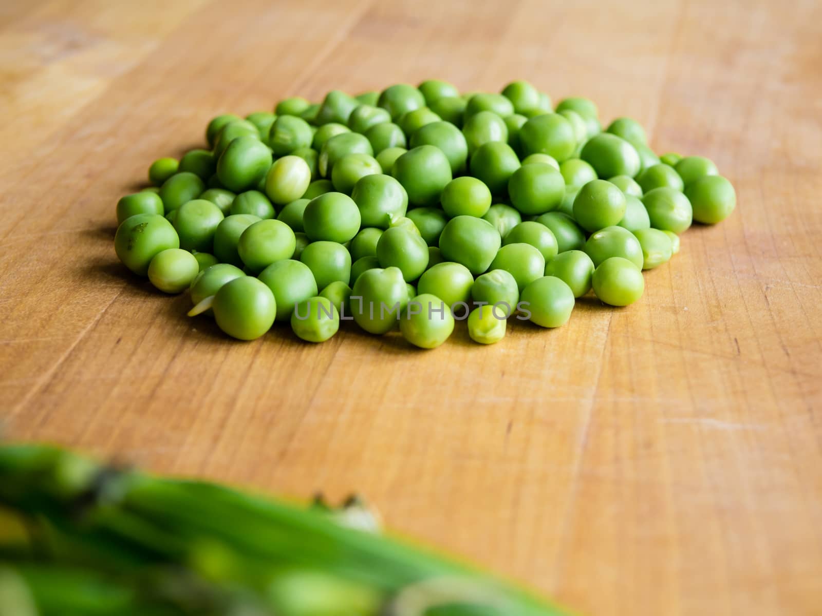 Pile of podded peas by weruskak