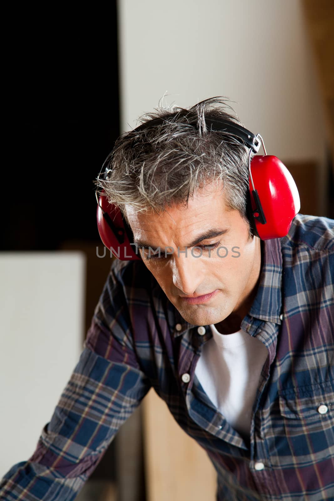 Concentrated man with headphones by ifilms