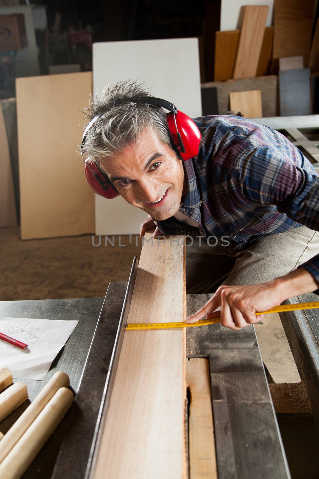 Happy man in his workshop