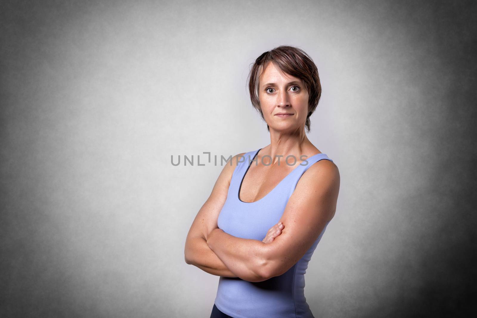Image of middle aged handsome woman in sportswear