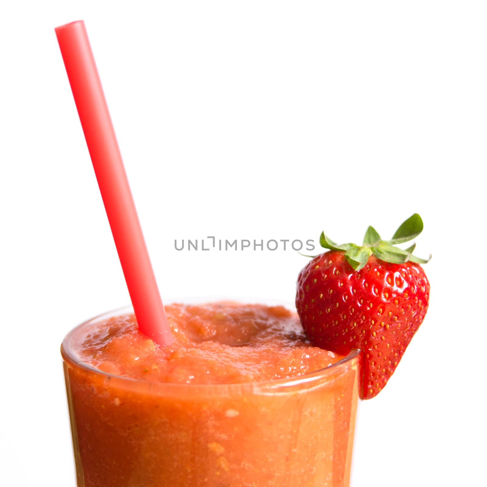 Isolated strawberry smoothie in glass with straw