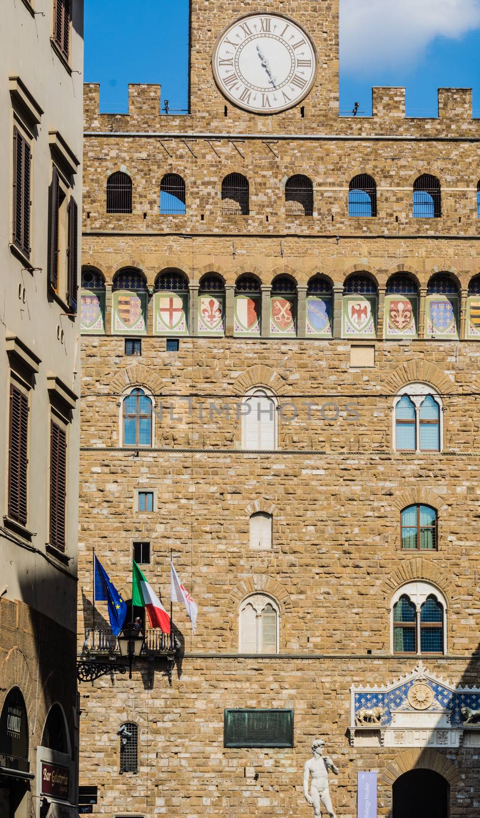 landmark view of palazzo vecchio and David in Florence