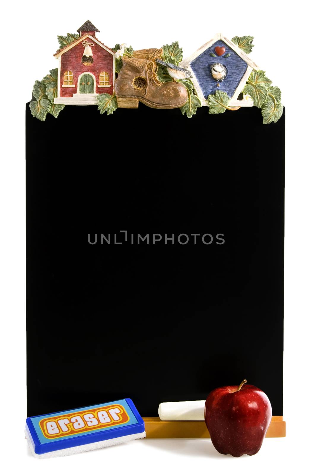 Vertical shot of back to school blackboard with red apple, eraser and chalk and isolated on white