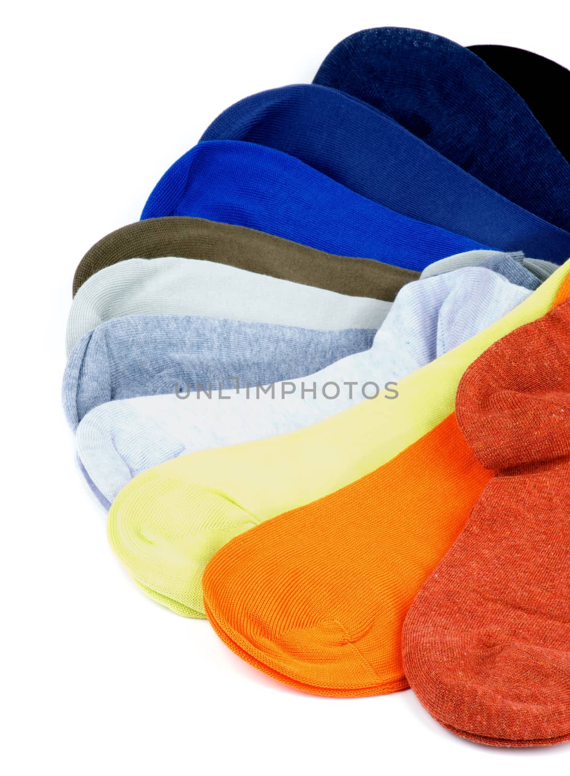 Arrangement of Colored Cotton Socks isolated on white background