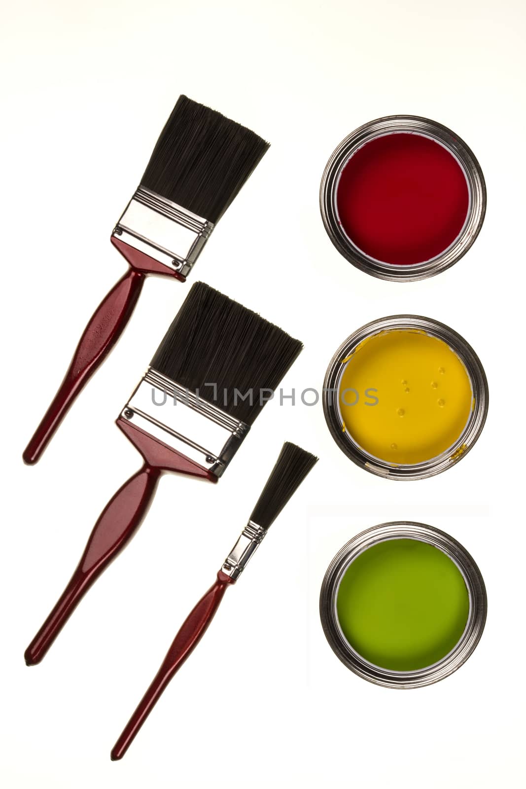 Selection of paints and paintbrushes - isolated