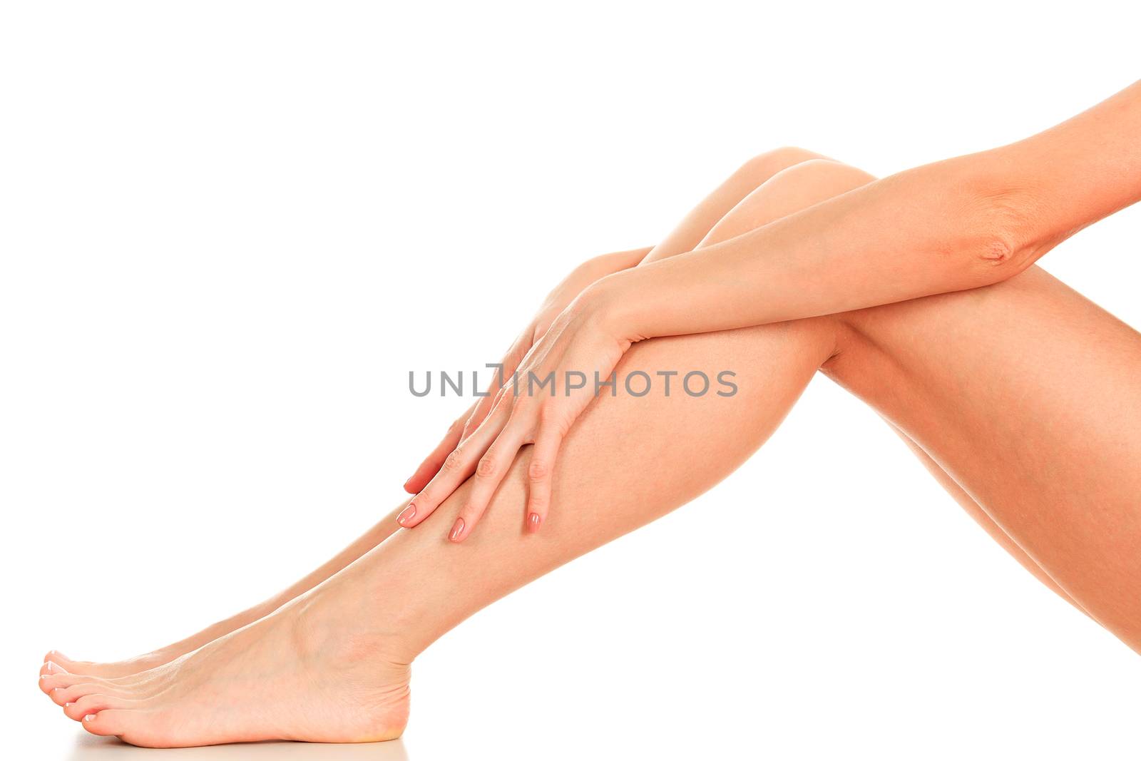 Female legs and hands, white background, isolated