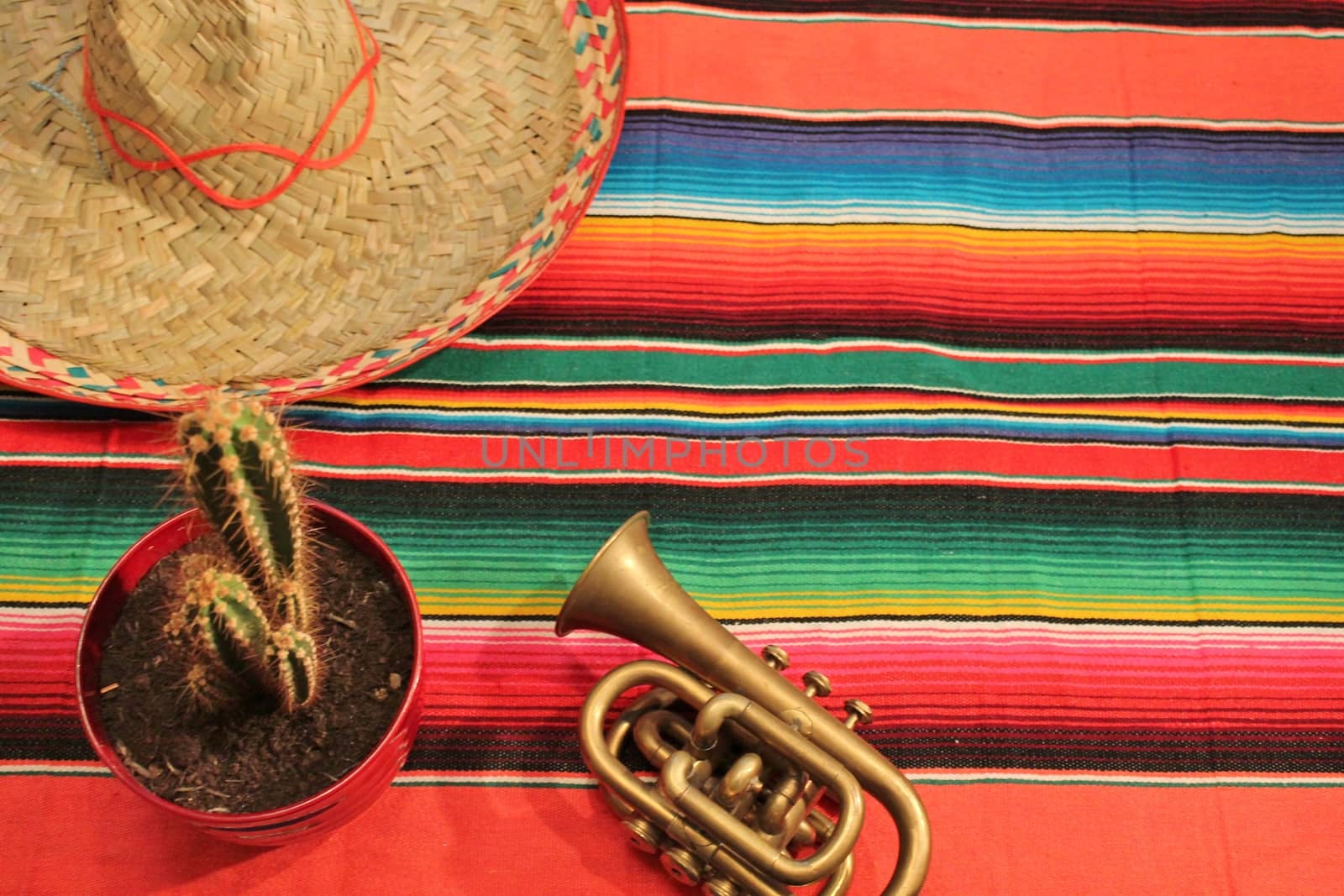 striped poncho serape fiesta background with copyspace