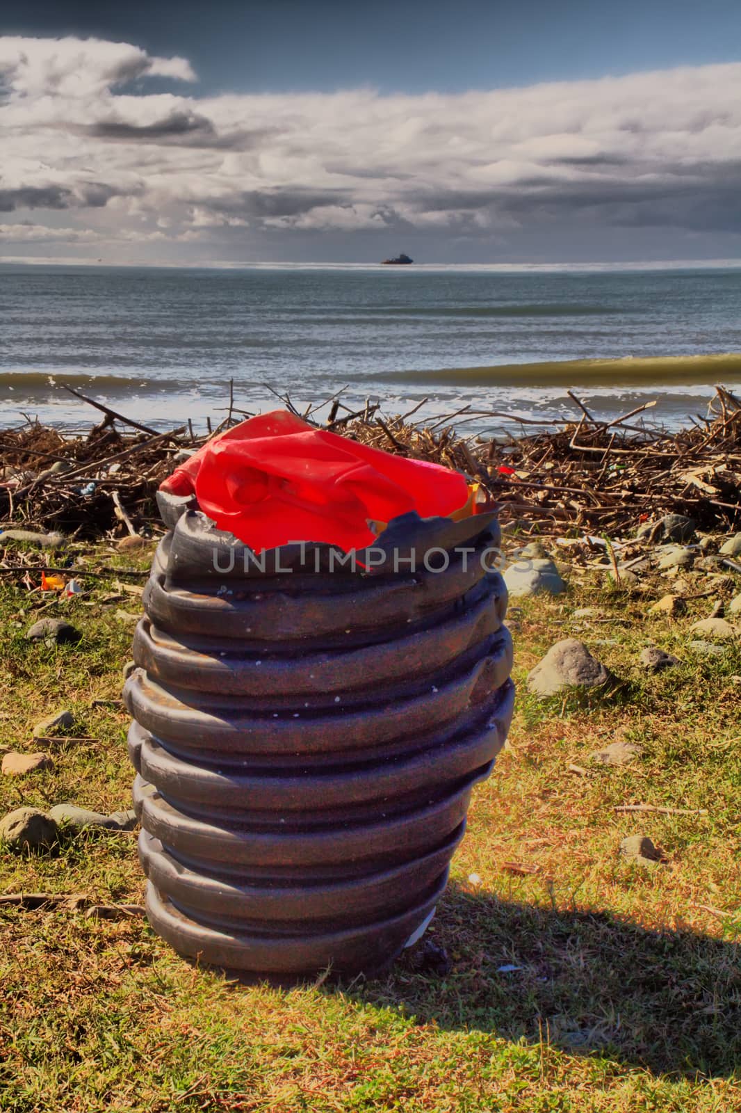 plastic trash discarded from the sea by a storm