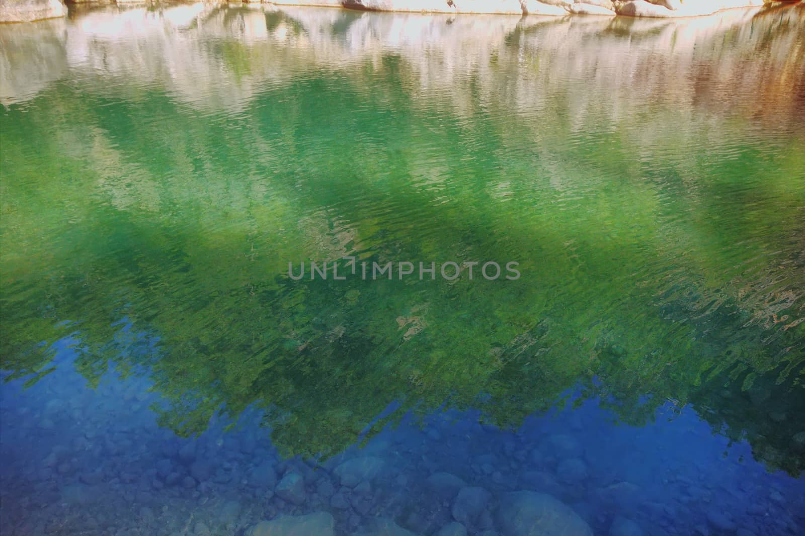 Mountain lake with clear water by max51288