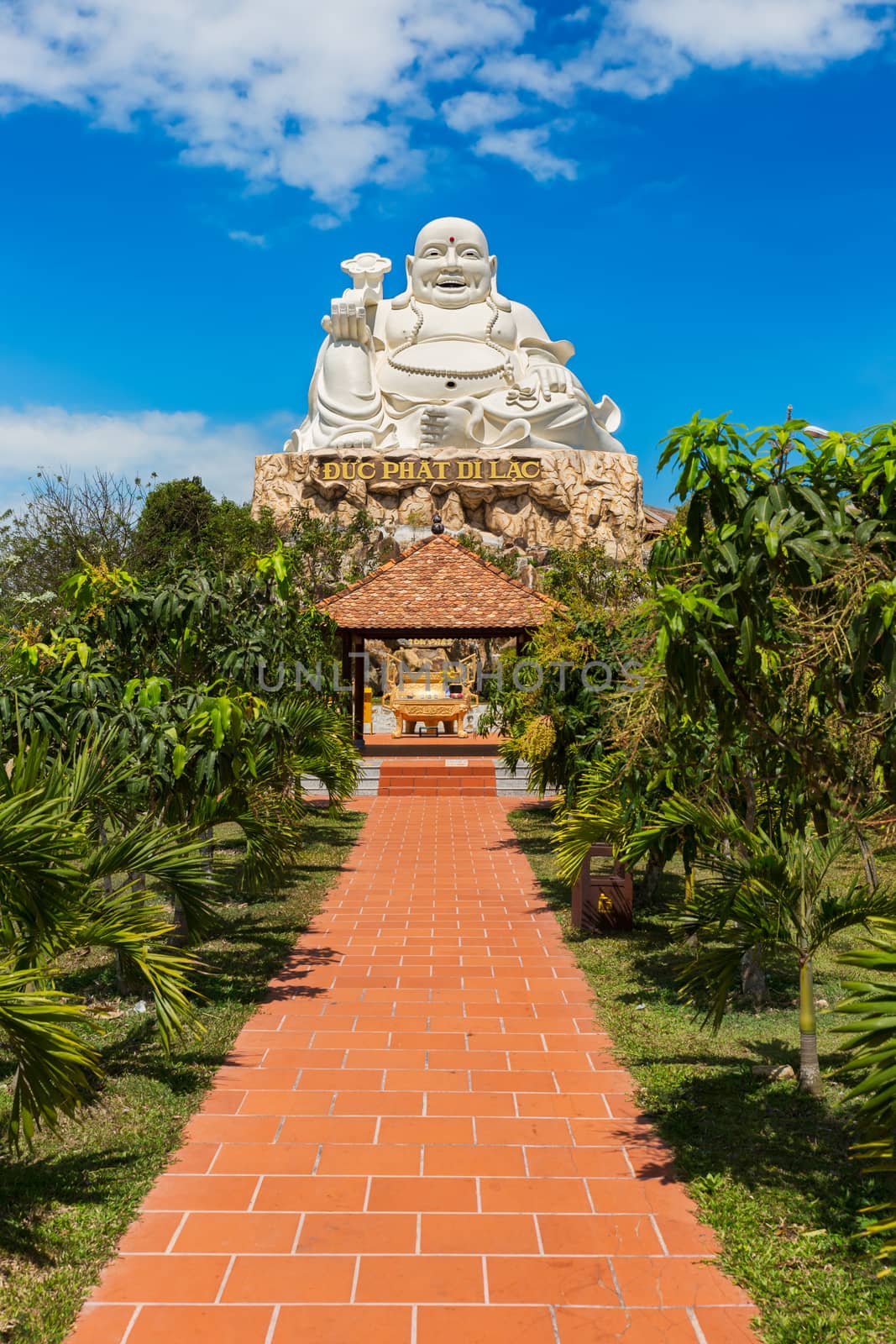 VUNG TAU, VIETNAM - JANUARY  2014: Buddha statue at top of a hill