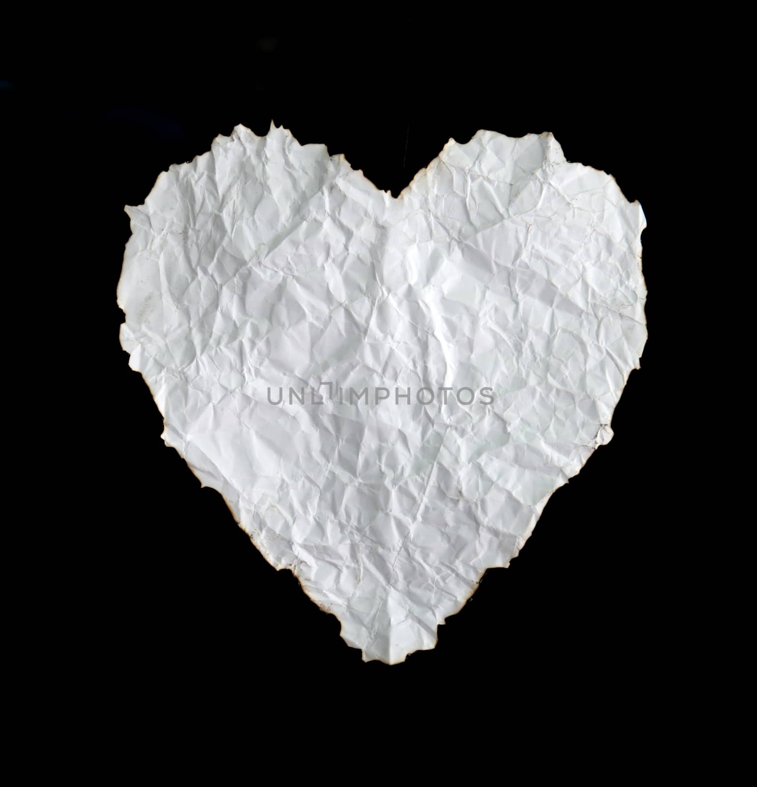 white crumpled  heart shape paper on white background