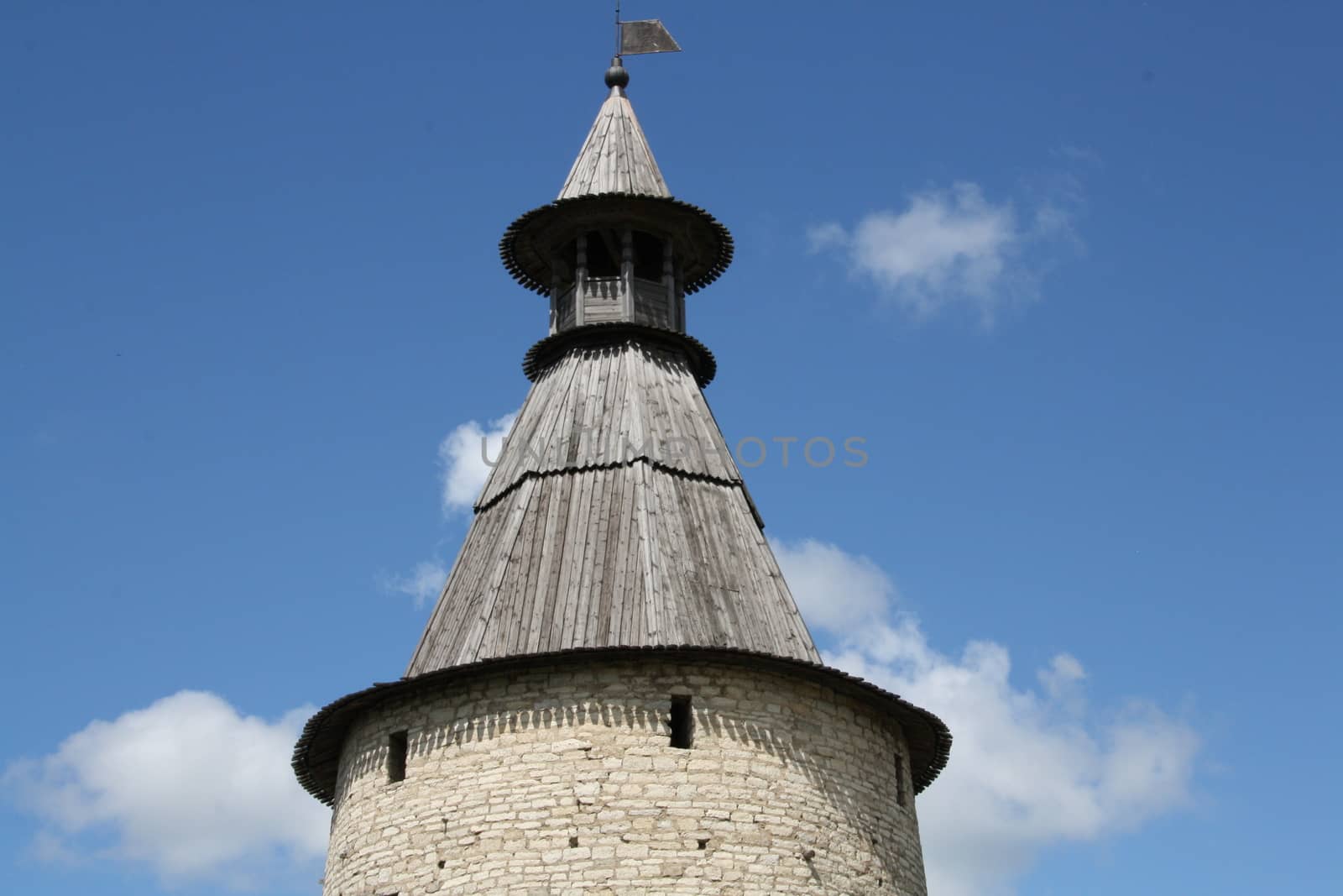 Classical Russian ancient architecture. Stone tower of old fortress. Kremlin of Pskov, Russia