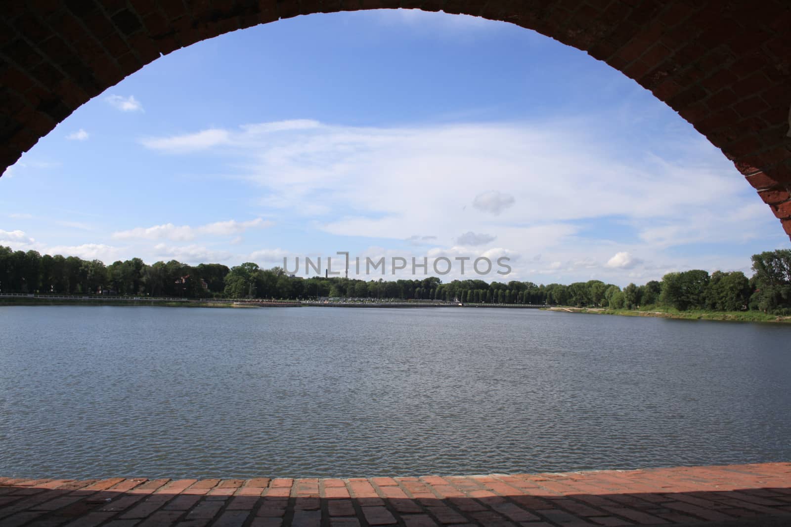 views of the Upper lake through the arch-defensive fortification complex in Kaliningrad