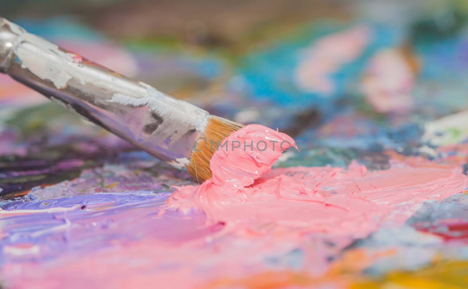 pink paint brushes and oil paints by Chechotkin