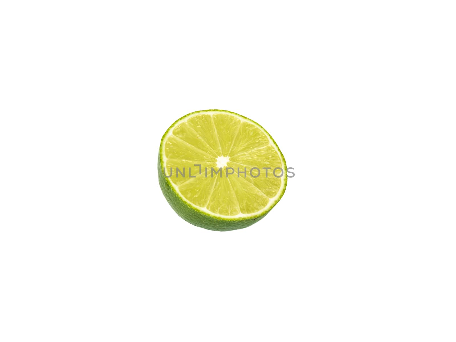 Lime cut in half on white background by matteocurcio