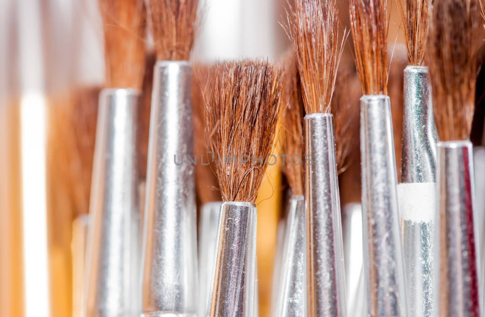 many brushes in art studio can be used as background