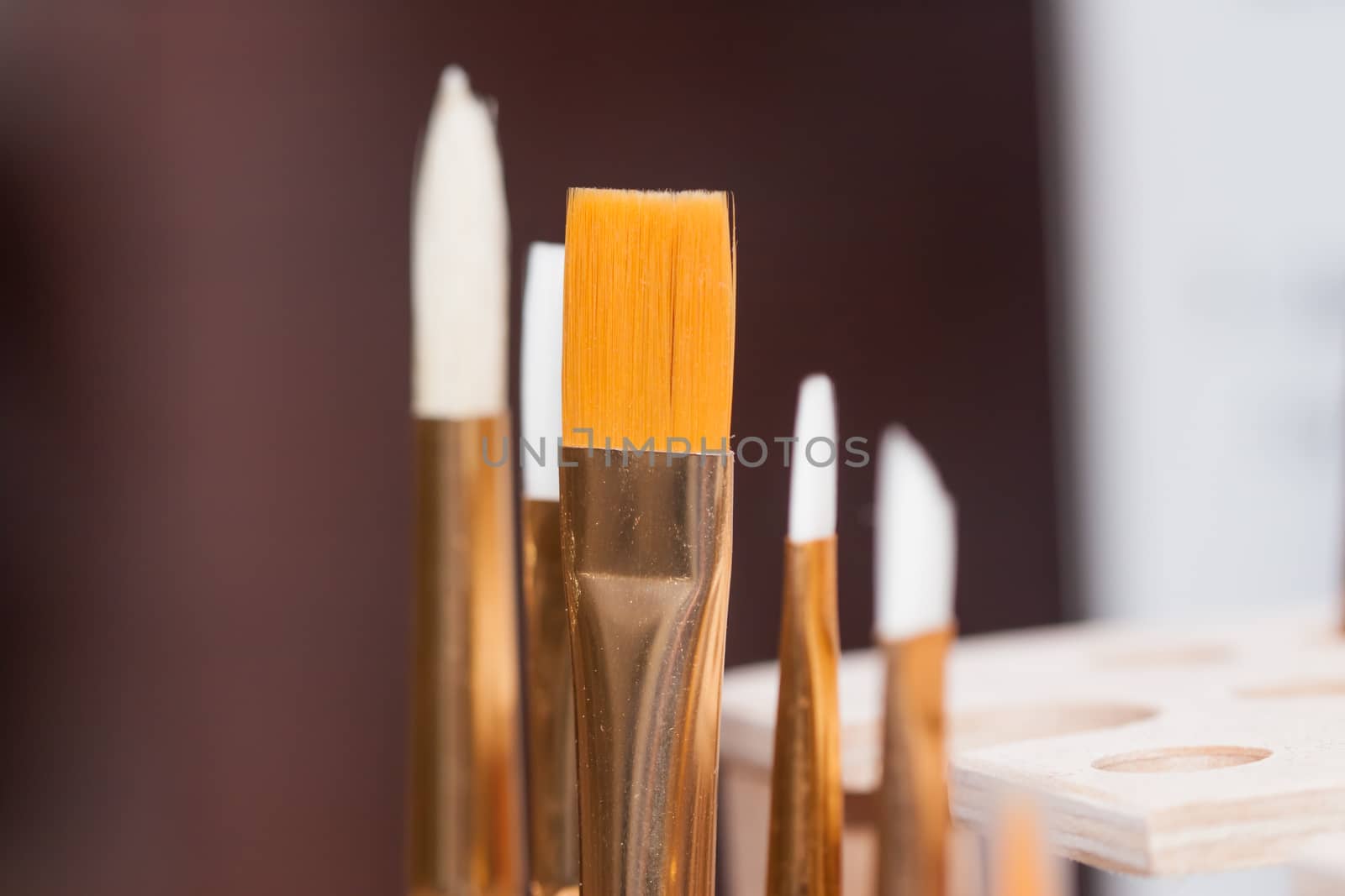 many brushes in art studio can be used as background