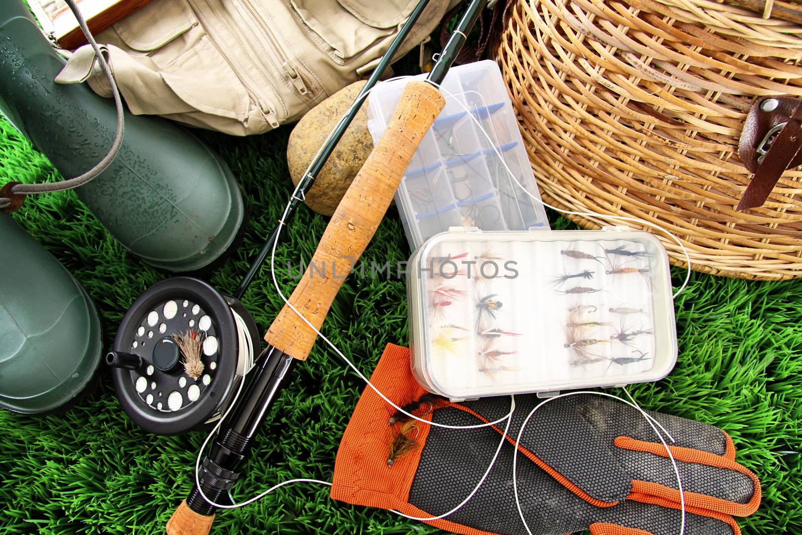 Fly fishing equipment and boots ready to use