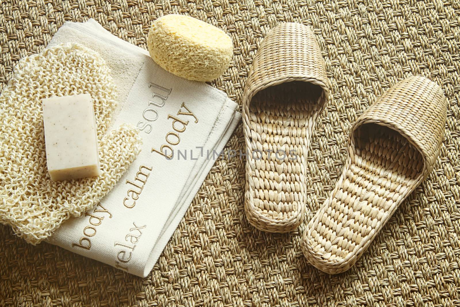 Spa setting with slippers, towel and soap by Sandralise