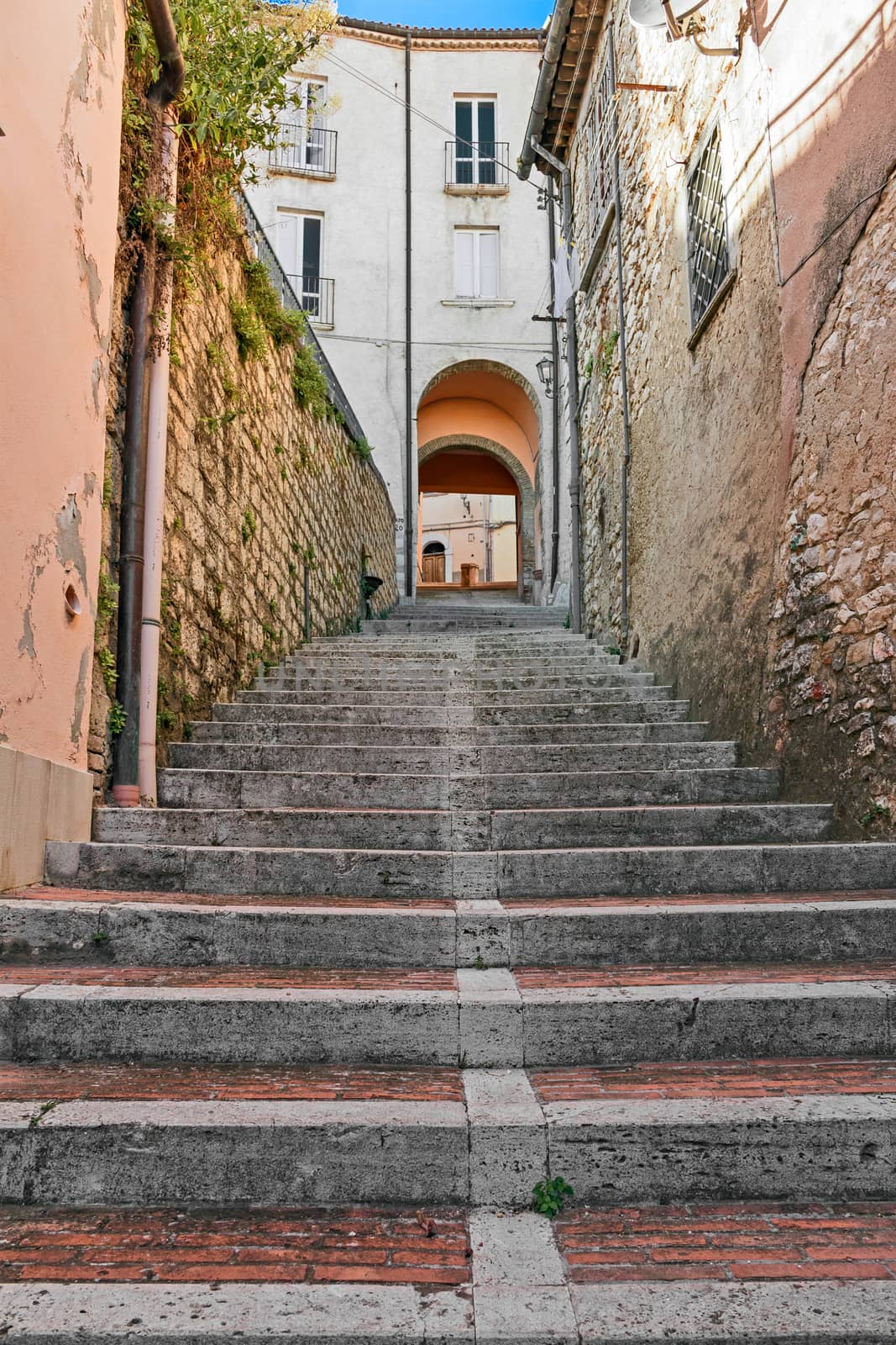 perspective of a stairway in alley