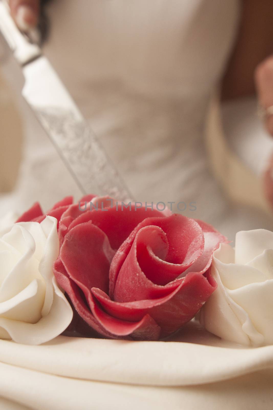marzipan red rose on wedding cake