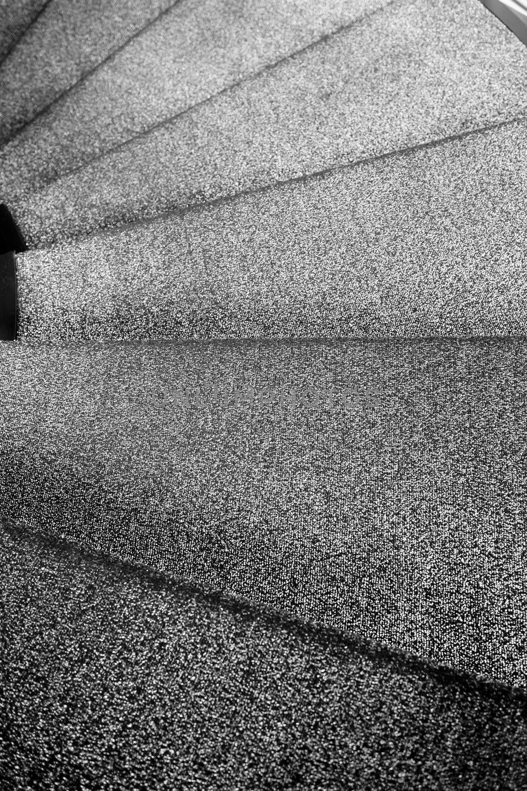 close up black and white spiral staircase