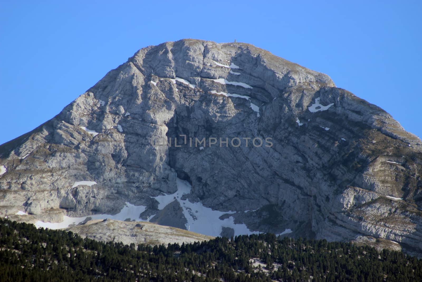 Snowy Mountain Peak In Sunny Spring Day. Autrans, France
