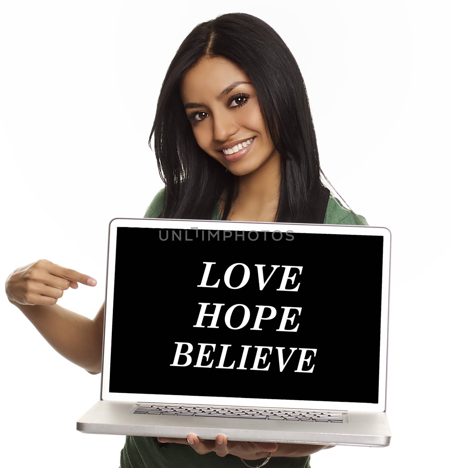 Pretty young woman pointing to inspiring aspirational message on laptop computer: Love,Hope,Believe.