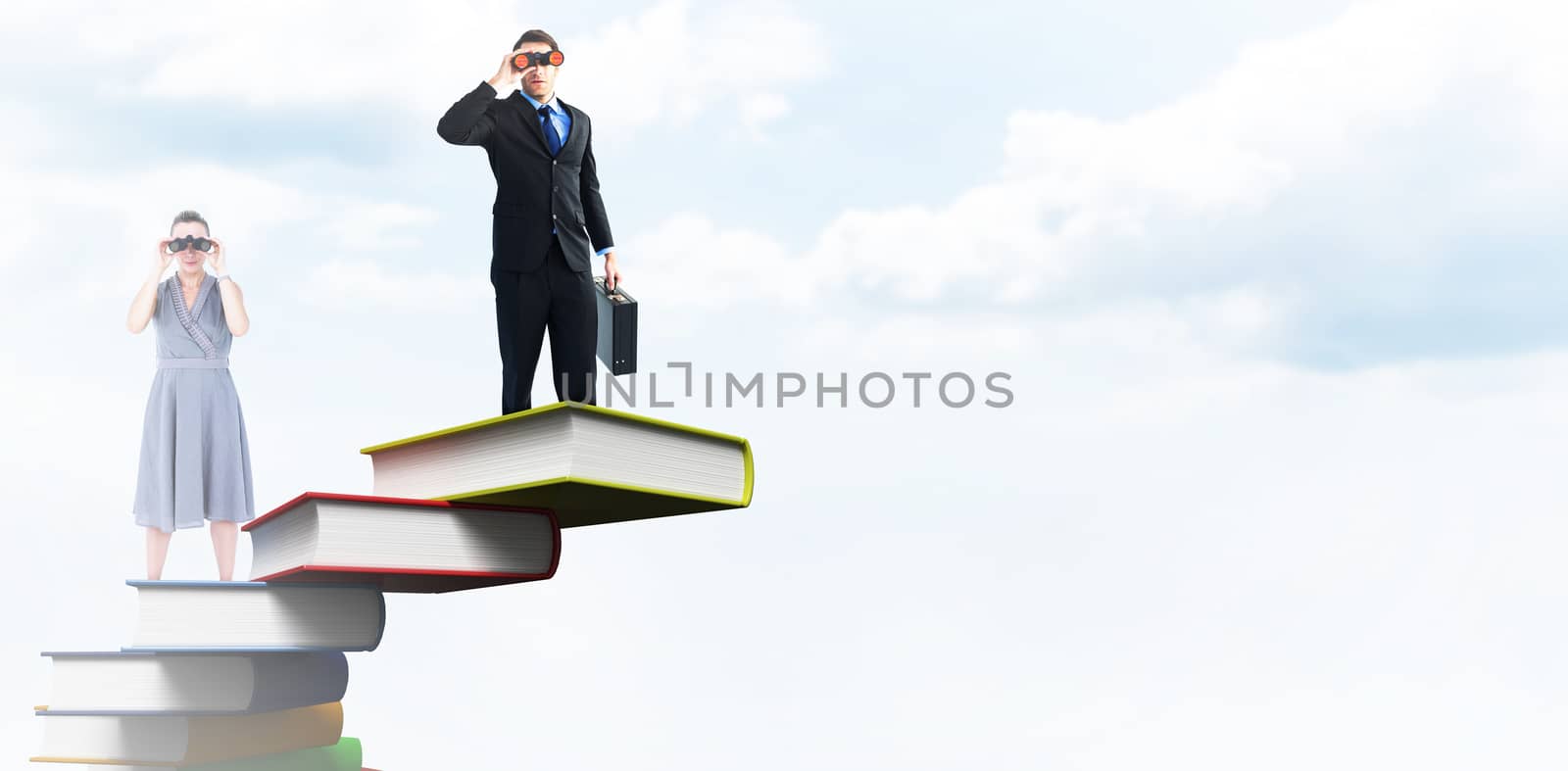 A businesswoman looking through binoculars against blue sky