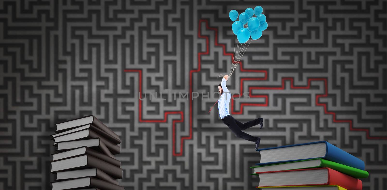 Businessman flying with balloons against grey maze