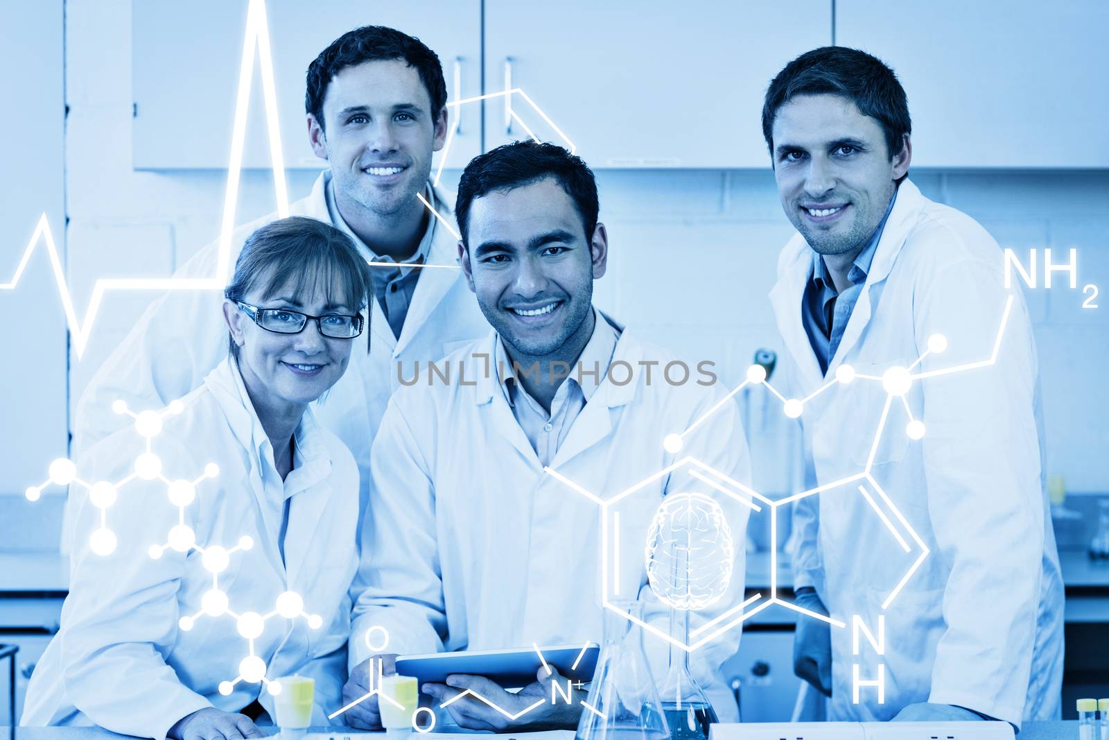 Science graphic against smiling scientists with tablet pc in the lab
