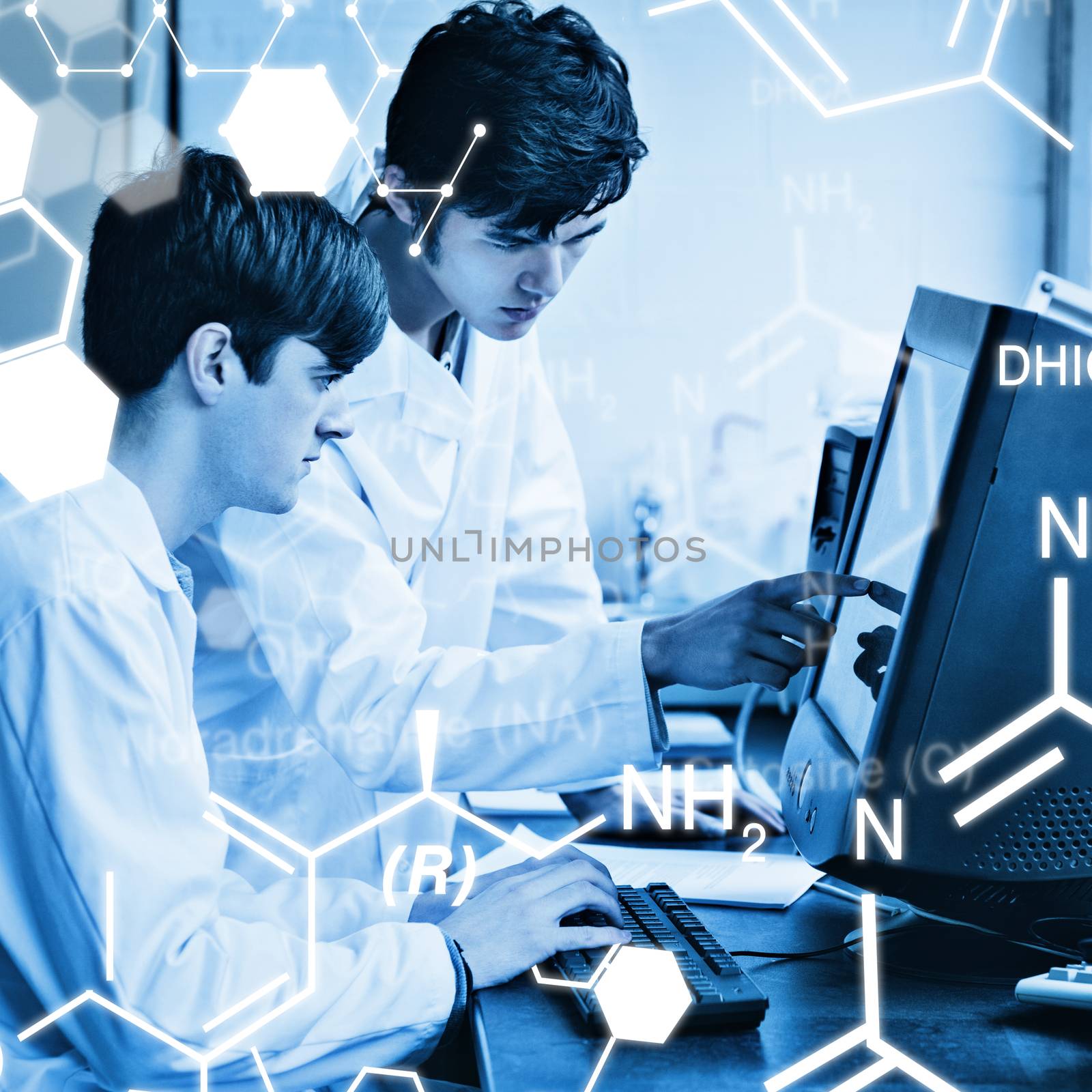 Science graphic against chemist pointing at something on a monitor to his colleague