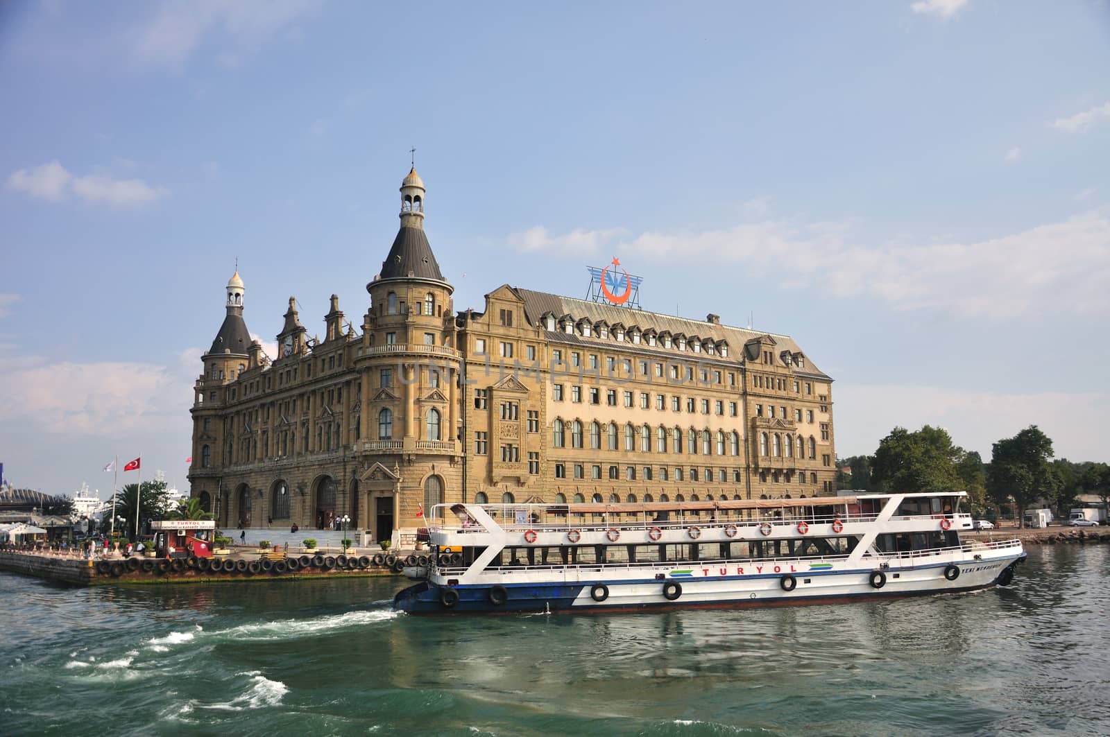Haydarpasha train station Istanbul and boat,  photographed from water