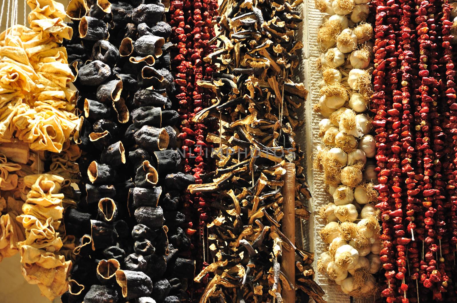 Group of dry fruits beem hanf and left to dry