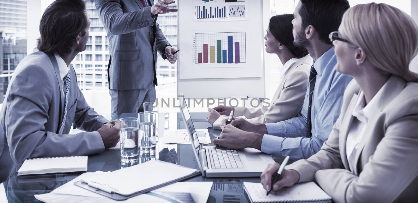 Young business people in board room meeting at the office