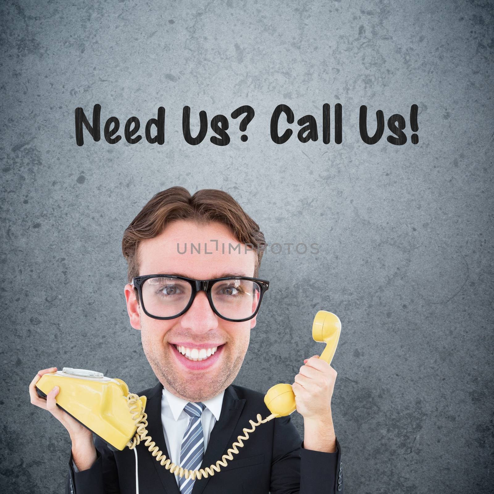 Geeky businessman holding phone against dirty old wall background