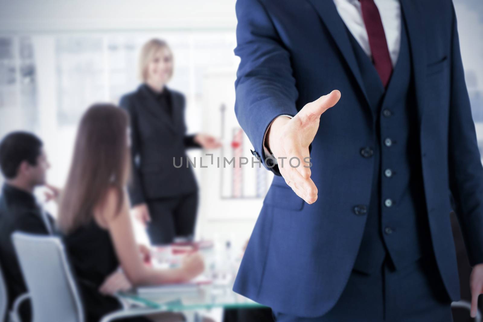 Composite image of businessman ready to shake hand by Wavebreakmedia