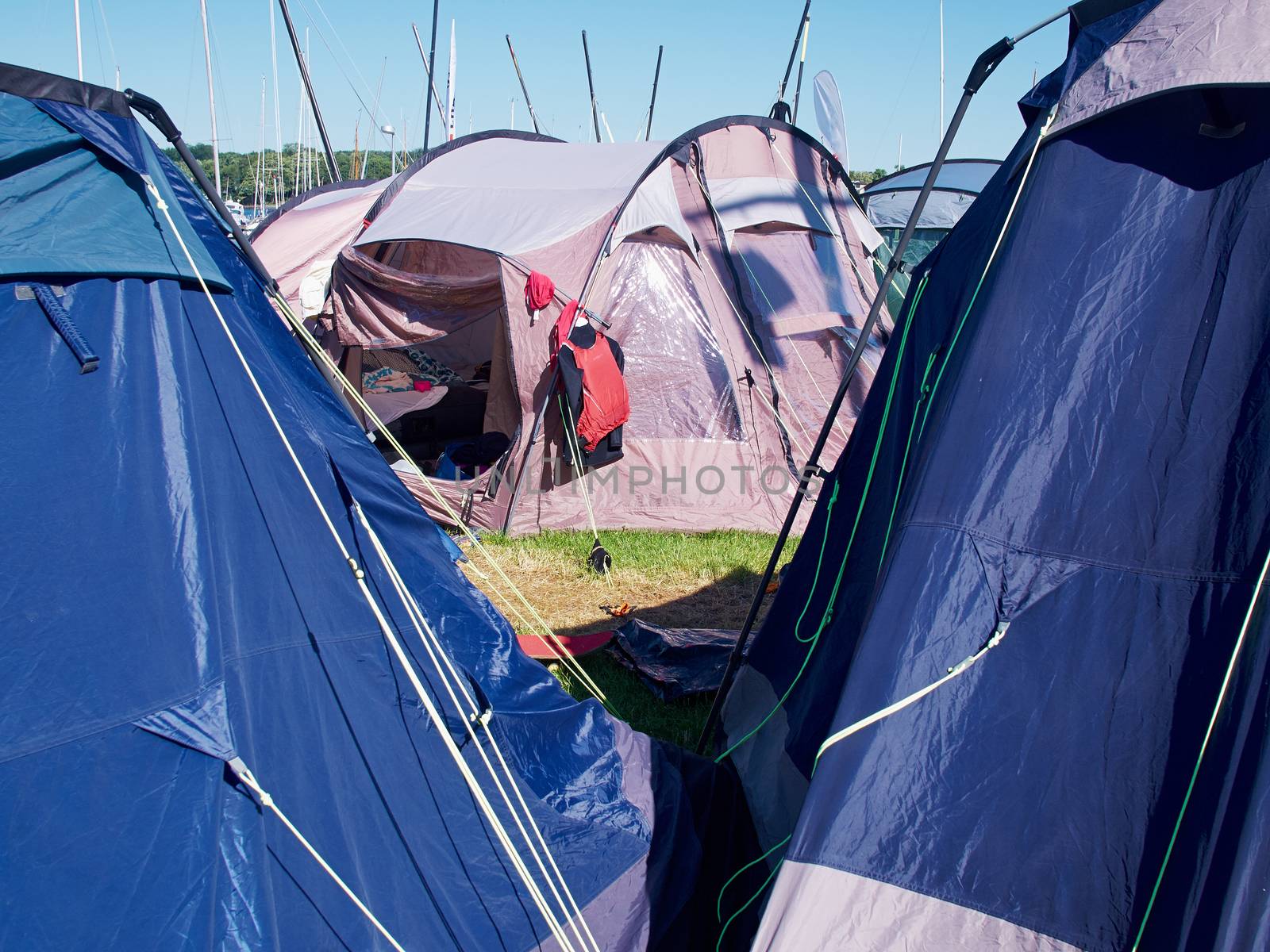 City of colorful tents in a sea beach camping site village
