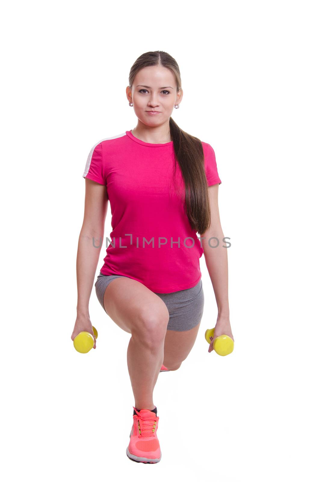 Young beautiful girl athlete spends Europeans physical exercise