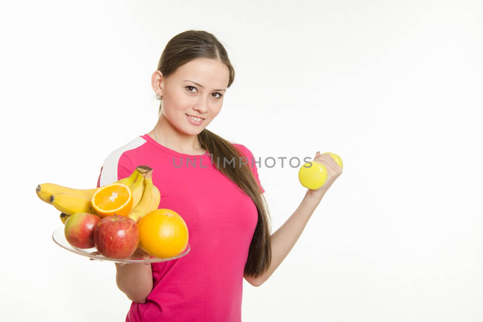 Young beautiful girl athlete spends Europeans physical exercise and promotes a healthy lifestyle