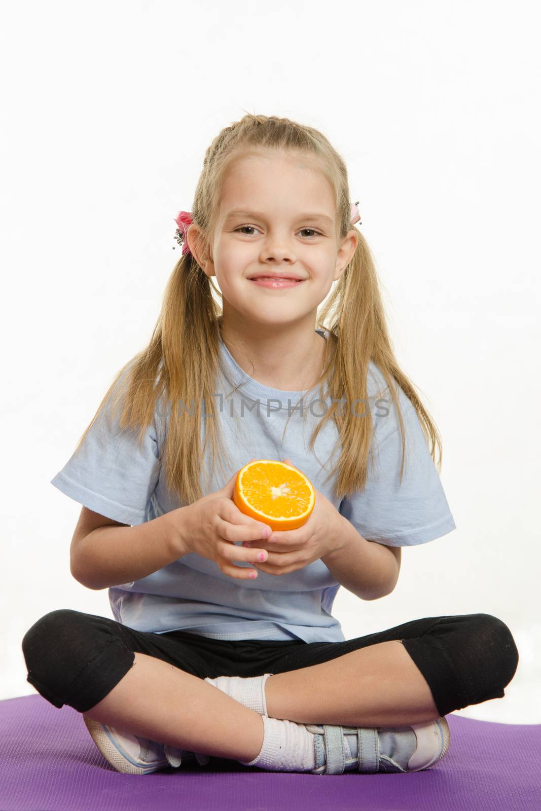 Six year old girl Europeans engaged in physical exercises